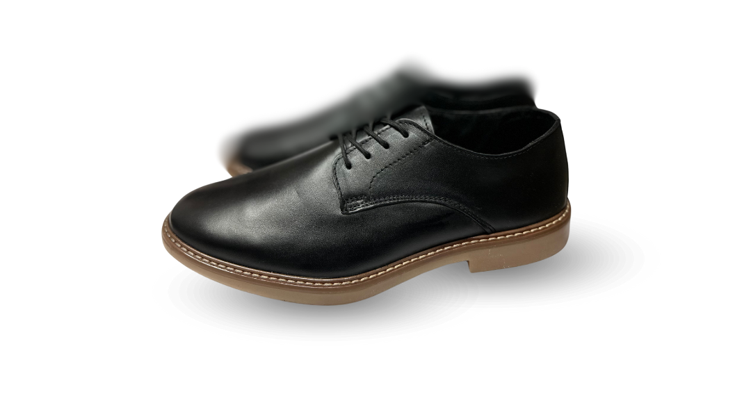 Zapato de vestir Clark de piel negra con suela ámbar - Calzado Jácome
